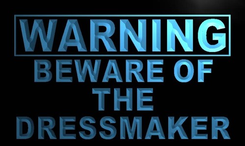 Warning Beware of the Dressmaker Neon Light Sign